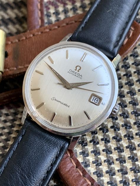 omega slimline|1960 omega seamaster automatic date.